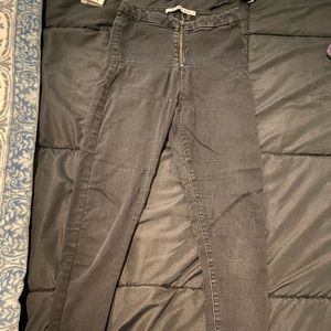 Black skinny jeans with only a zipper